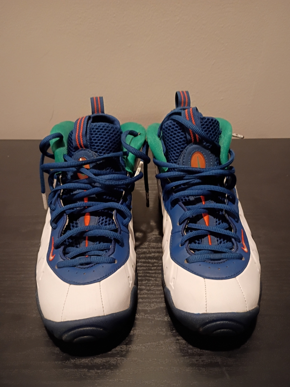 Nike Kids White and Blue Sneakers with Green and Orange Accents